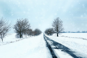 Rural road with snow. Winter concept.