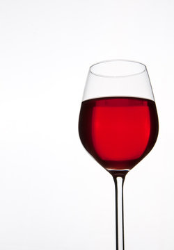 Glass of red wine isolated. Copyspace