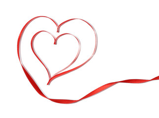 Red ribbon in shape of heart isolated on white
