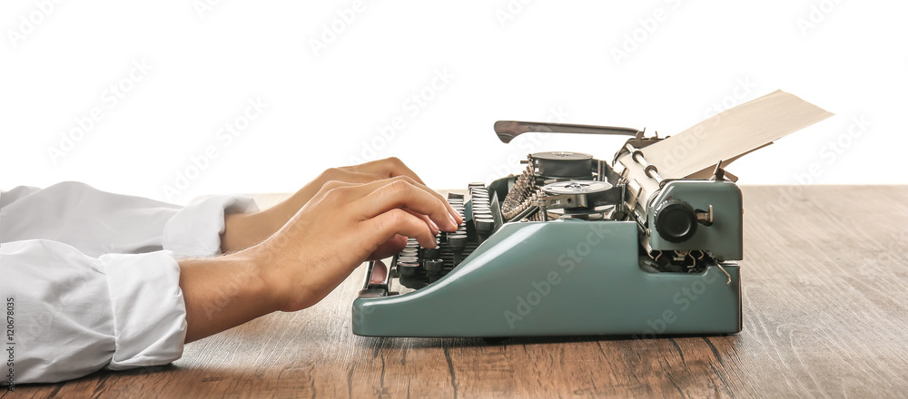 Poster man working on retro typewriter at desk on white background