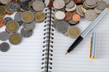 business finance. save money for investment concept coins and pe