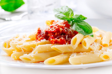 Pasta Penne with Bolognese sauce, Parmesan cheese and Basil