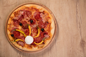 Pizza served on wooden board