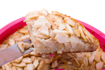 Charlotte from apples and the girl's hand, with a shovel