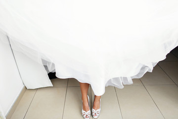 Pretty brunette smiling bride on the wedding day