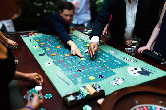 People play poker in the casino
