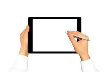 Hand holding stylus near graphic tablet blank screen. Empty tab display mock up isolated. Designer drawing, painting, sketching. New digitizer pencil presentation. Black tablet touchscreen mockup.