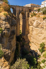 Puente Nuevo and buildings on the cliffside of El Tajo Gorge in Ronda, Malaga province, Spain.