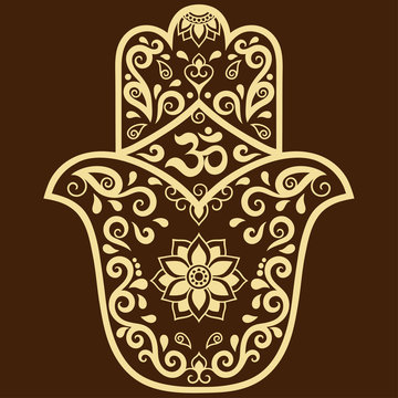 Vector hamsa hand drawn symbol. OM decorative symbol. Decorative pattern in oriental style for the interior decoration and drawings with henna. The ancient symbol of the " Hand of Fatima ".
