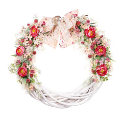 decorative wreath on the door with flowers isolated