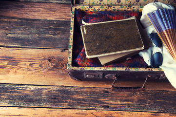 Packed suitcase. Vintage retro. Top view, copyspace
