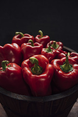 Bucket with red peppers