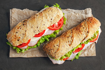 Sandwich with ham and tomatoes