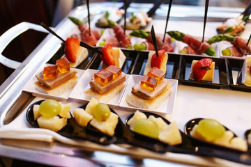 variety of meat, fish and fruit snacks