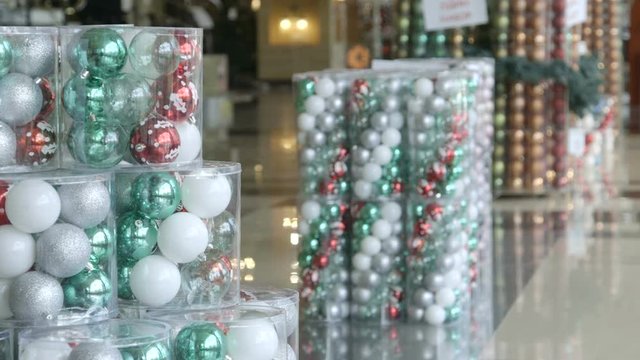Christmas tree balls ornaments buckets in shopping mall hall 