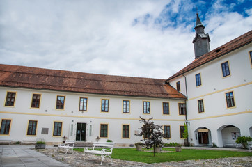 Courtyard of the Skofja Loka Castle with tower in Slovenia