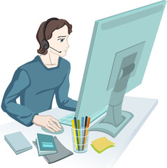 Young man is working on the computer. 