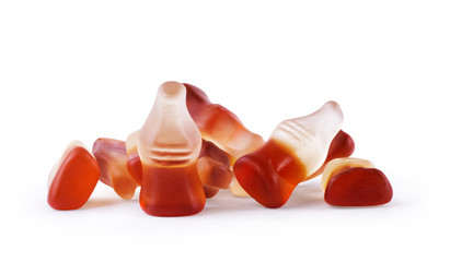Cola flavored gummy jellies in the shape of cola bottles,isolate