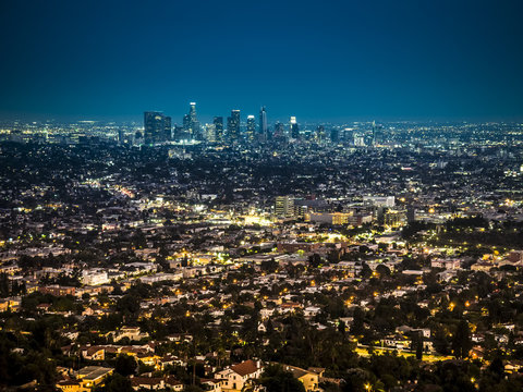 View of the downtown Los Angeles skyline at night, from Griffith Observatory, in Griffith Park, Los Angeles, California.