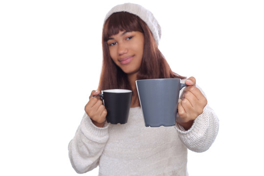 Afro Young Girl in Winter Clothes Holding Two Cups and Offering One