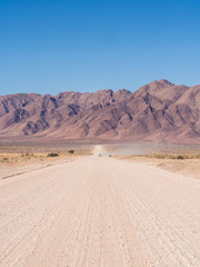 Fototapeta na wymiar Typical gravel road in Namibia.