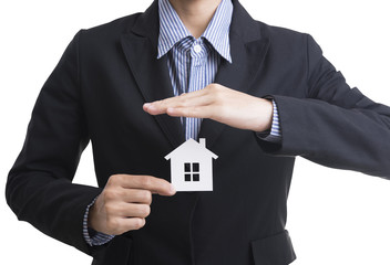 business salesman hand holding home concept home insurance.