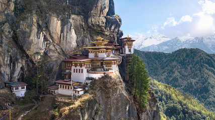 Taktshang Goemba or Tiger's nest Temple or Tiger's nest monastery the beautiful buddhist temple.The most sacred place in Bhutan is located on the high cliff mountain with sky of Paro valley, Bhutan. - obrazy, fototapety, plakaty