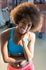 Fototapeta na wymiar African American woman training in gym