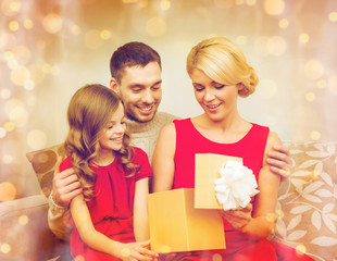 happy family opening gift box