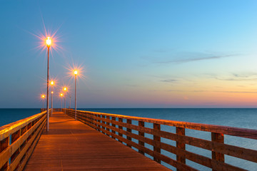 Pier with night lighting in the town of Zelenogradsk on the coast of the Baltic sea