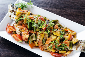 asian grilled fish with sweet and sour vegetables