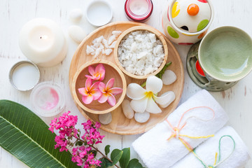 Beauty and fashion concept with spa set on white rustic wooden background