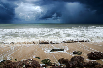 Rain cloud and Stormy sea.