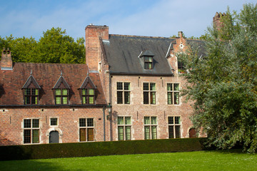 Fototapeta na wymiar Old historic houses in Grand Beguinage in Leuven. Belgium. Flanders.