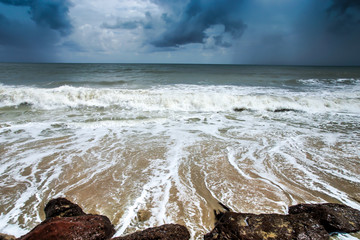 Rain cloud and Stormy sea.