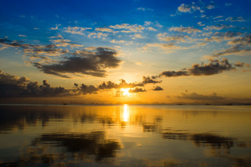 Fototapeta na wymiar Sunset sky and clouds over the lake, Thailand.