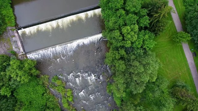 Mountain river and green riverbank from above.