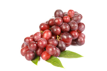 Red grape with leaf isolated on white background