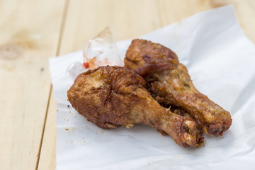 Deep fried marinate chicken leg with garlic