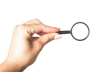 Hand holding magnifying glass isolated on white background