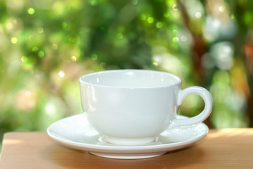 Obraz na płótnie Canvas White cup coffee in the morning time.