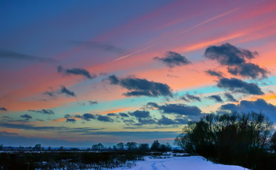 Winter Landscape With Pink Clouds At Sunset