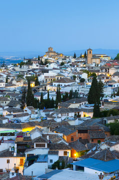 Spain, Andalucia, Granada Province, Granada, Sacromonte and Albaicin Districts, centre is Iglesia de San Cristobal (Church of St. Christopher) and right Iglesia de San Bartolome (Church of Bartholomew)