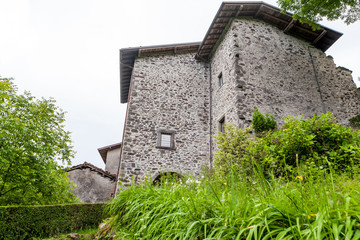 Old stone house with grass