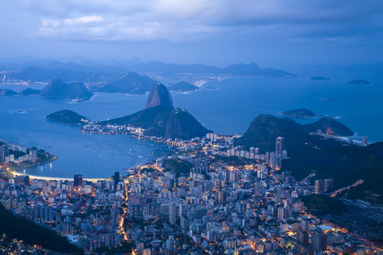 Brazil, Rio De Janeiro, Cosme Velho, View of Sugar Loaf mountain and Botafogo Bay from Cocovado at night