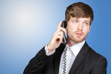 Portrait of a businessman talking on the phone