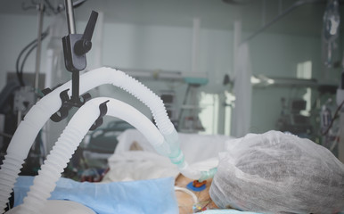 Patient on mechanical ventilation in a coma