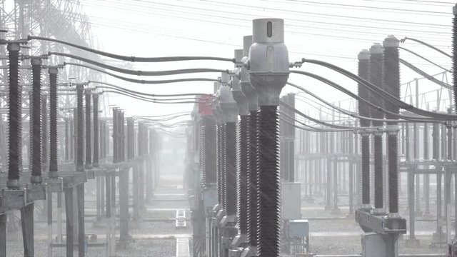 Slow Motion Electricity substation in the rain