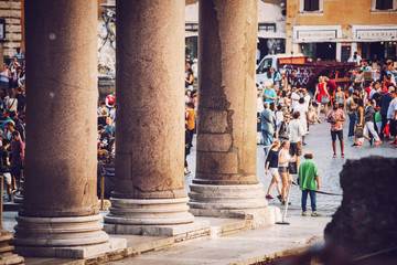 ROME, ITALY - JULY 14 2016: Street view with toutists, close to