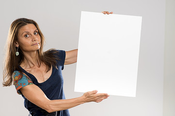 Woman shows on white poster